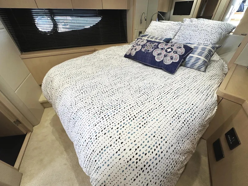 Slide: The Image of Luxurious bedroom interior of 2015 Sunseeker Predator 57 yacht with patterned bedding. - 32
