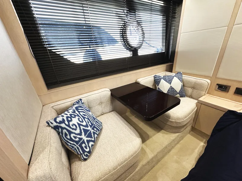 Slide: The Image of Luxurious interior of 2015 Sunseeker Predator 57 yacht with cozy seating and decorative pillows. - 40