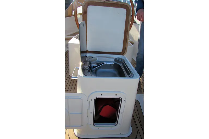 Slide: The Image of 2014 AdmiralsTender C28 boat sink and storage compartment on deck. - 9