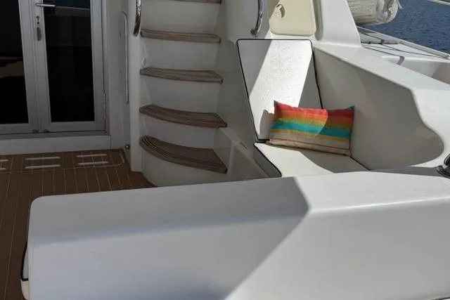 Slide: The Image of Luxurious Africat Marine 420 yacht interior with stairs and colorful cushion, 2007 model. - 14