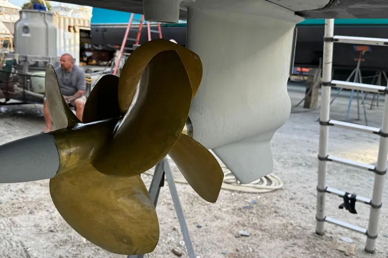 Slide: The Image of Close-up of a 2007 Africat Marine 420 propeller in a boatyard setting. - 36