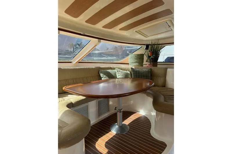 Slide: The Image of Luxurious interior of 2007 Africat Marine 420 yacht with elegant seating and wooden table. - 37