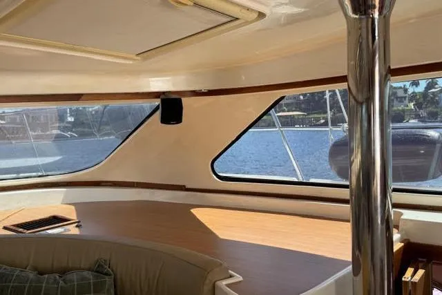 Slide: The Image of Interior of 2007 Africat Marine 420 yacht with panoramic windows and seating area. - 45