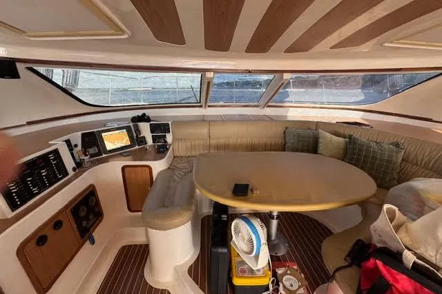 Slide: The Image of Interior of 2007 Africat Marine 420 yacht with navigation equipment and seating area. - 55
