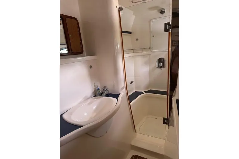 Slide: The Image of Bathroom interior of 2007 Africat Marine 420 yacht, featuring sink and shower. - 72