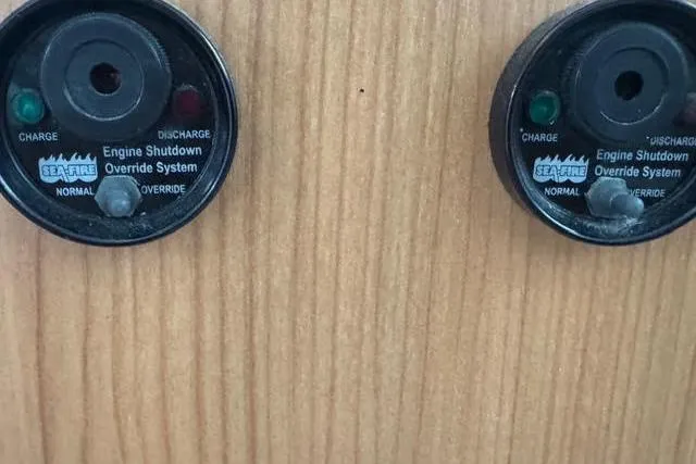 Slide: The Image of Control panel of 2007 Africat Marine 420 with Sea-Fire engine shutdown system. - 73