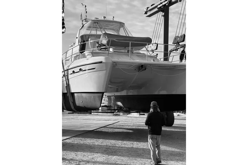 Slide: The Image of 2007 Africat Marine 420 catamaran on dry dock, viewed from the front. - 80