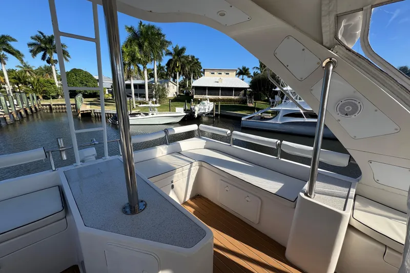 Slide: The Image of Luxurious 2007 Africat Marine 420 yacht interior with spacious seating and scenic marina view. - 85
