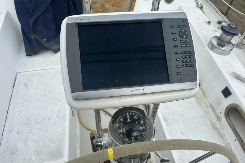 Slide: The Image of Garmin GPS and compass on 1985 Catalina 36 sailboat cockpit. - 16