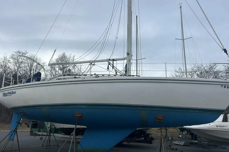 Slide: The Image of 1985 Catalina 36 sailboat "WaveWalker" on stands, ready for maintenance. - 3