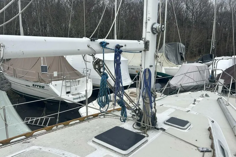 Slide: The Image of Sailboat deck view of a 1985 Catalina 36 in a marina. - 47