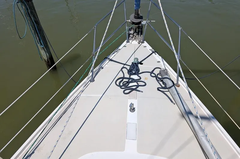 Slide: The Image of Bow of a 1985 Catalina 36 sailboat with ropes and rigging. - 90