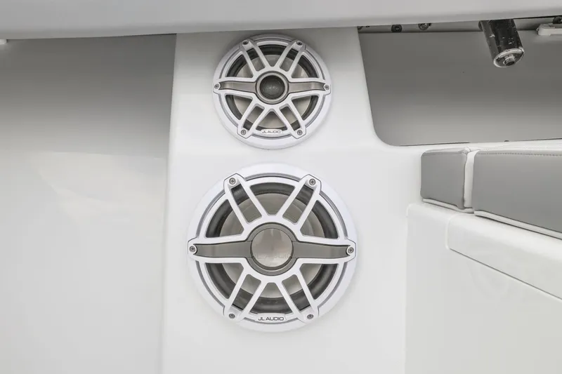 Slide: The Image of 2026 Yellowfin 32 Offshore boat speakers, JL Audio, white interior detail. - 24
