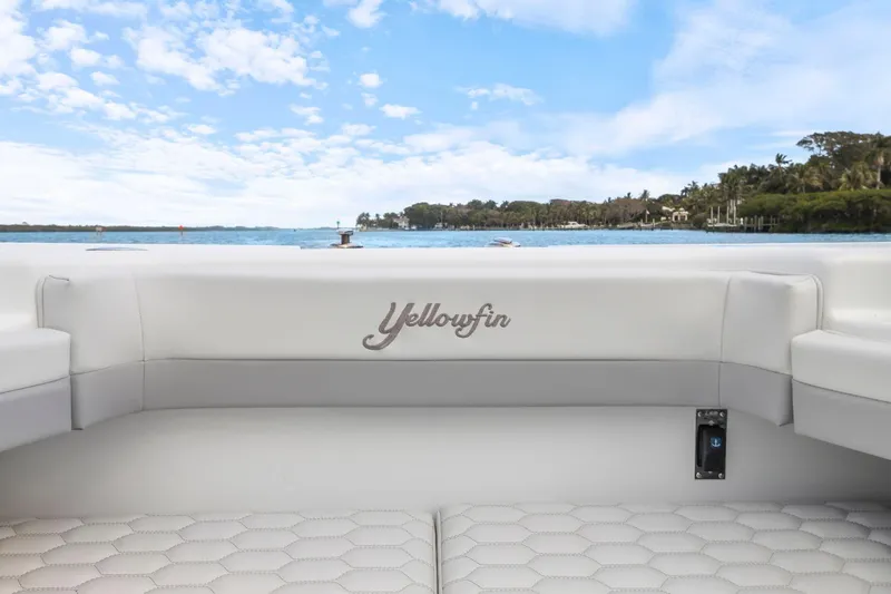 Slide: The Image of 2026 Yellowfin 32 Offshore boat interior with scenic ocean view. - 36