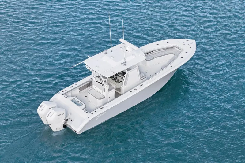 Slide: The Image of 2026 Yellowfin 32 Offshore boat on clear blue water. - 5