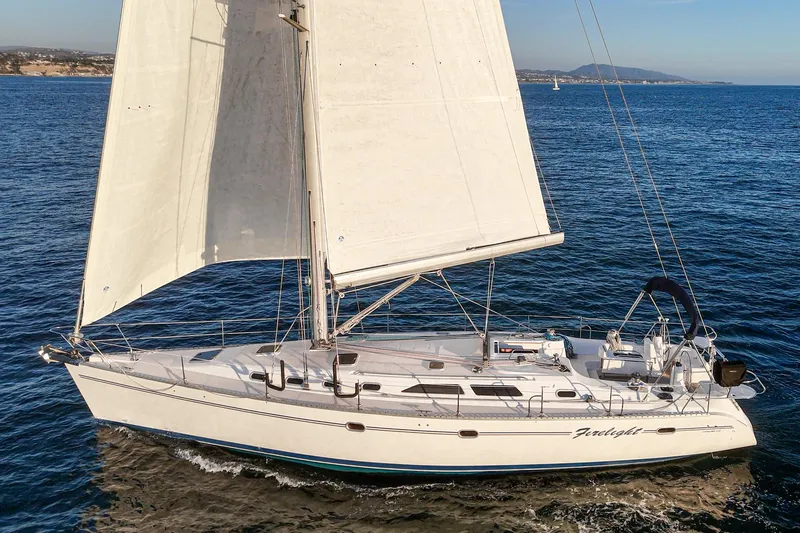 Slide: The Image of Sailing yacht Catalina 470, 1999 model, cruising on open sea. - 16