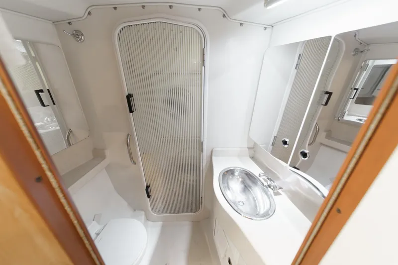 Slide: The Image of Bathroom interior of 1999 Catalina 470 yacht with shower, sink, and toilet. - 47