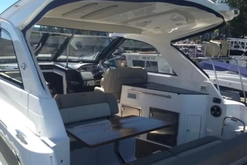 Slide: The Image of Cockpit area - excellent weather protection w/ retractable hardtop - 4