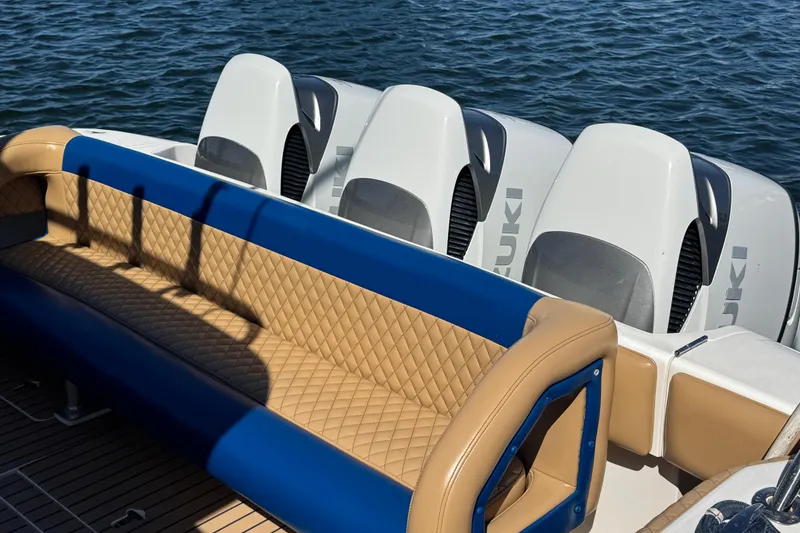 Slide: The Image of Luxurious seating and powerful engines on a 2012 Intrepid 390 Sport Yacht. - 23