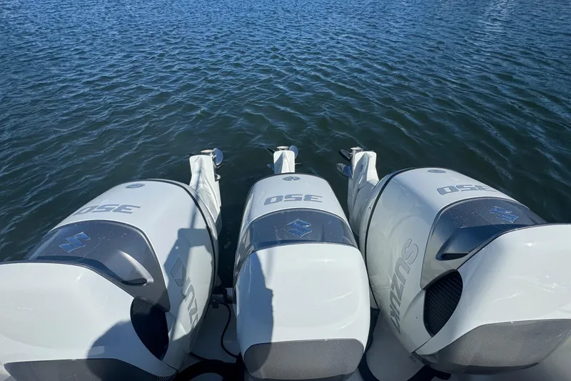Slide: The Image of Triple Suzuki 350 outboard engines on a 2012 Intrepid 390 Sport Yacht. - 25