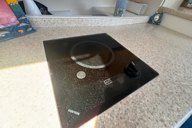 Slide: The Image of Kenyon cooktop on Intrepid 390 Sport Yacht 2012, set in a sleek countertop. - 67