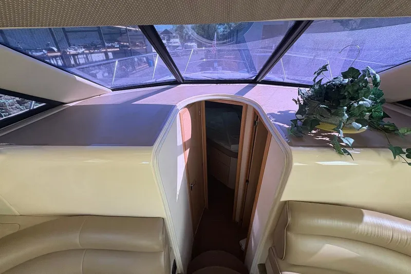 Slide: The Image of Interior of 2001 Bayliner 3488 Command Bridge Motoryacht with skylight and potted plant. - 19