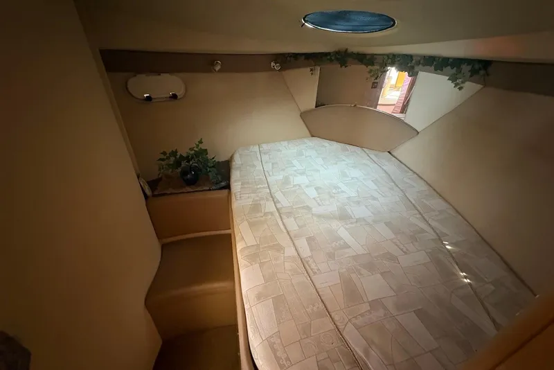 Slide: The Image of Interior cabin of 2001 Bayliner 3488 Command Bridge Motoryacht with bed and porthole. - 25