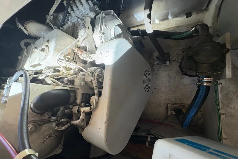 Slide: The Image of Engine compartment of a 2001 Bayliner 3488 Command Bridge Motoryacht, showcasing mechanical components. - 31