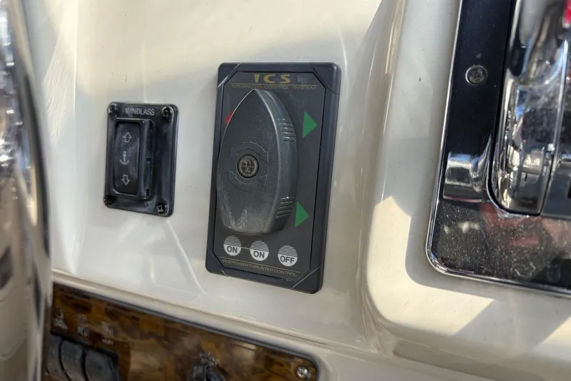 Slide: The Image of Control panel of a 2001 Bayliner 3488 Command Bridge Motoryacht, featuring windlass and thruster controls. - 7