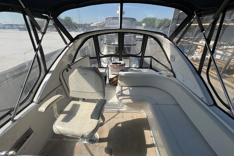 Slide: The Image of 2001 Bayliner 3488 Command Bridge Motoryacht interior with seating and helm station. - 9