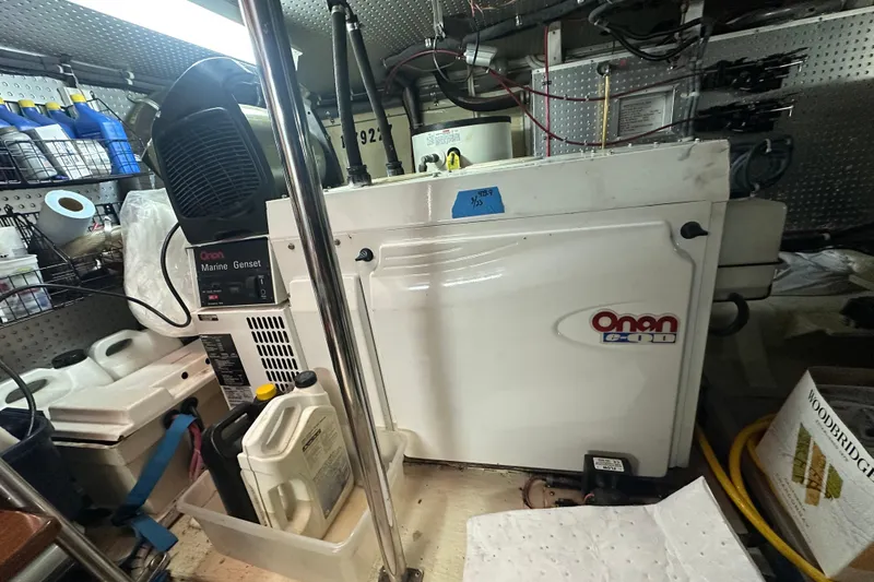 Slide: The Image of Engine room of 2006 Novatec Islander 55 with Onan marine generator. - 107