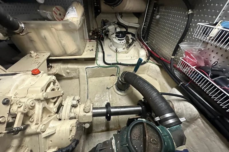 Slide: The Image of Engine room of 2006 Novatec Islander 55 yacht, showing mechanical components and storage. - 114