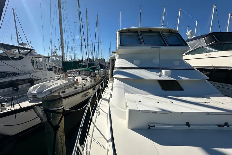 Slide: The Image of 2006 Novatec Islander 55 yacht docked among sailboats in a marina. - 14