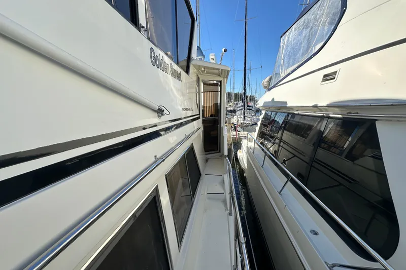 Slide: The Image of Novatec Islander 55 yacht, 2006 model, docked in marina, side view. - 19