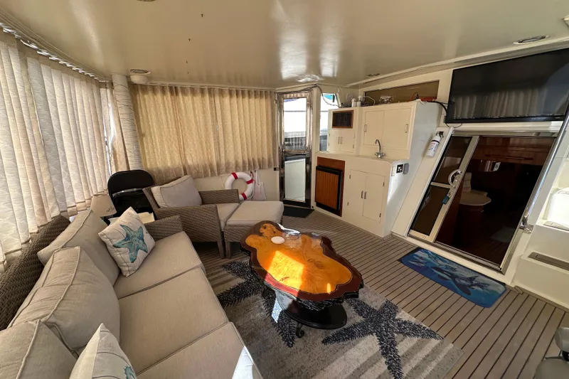 Slide: The Image of Luxurious 2006 Novatec Islander 55 yacht interior with cozy seating and elegant decor. - 25