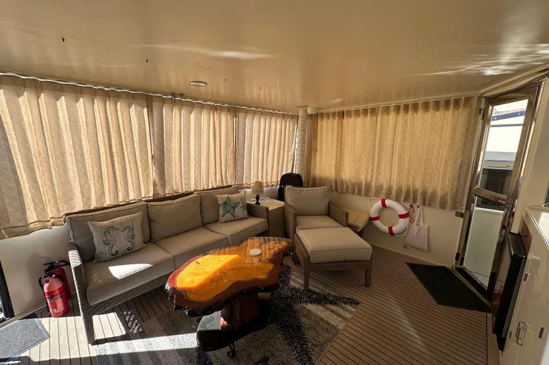 Slide: The Image of Luxurious interior of 2006 Novatec Islander 55 yacht with cozy seating and elegant decor. - 28