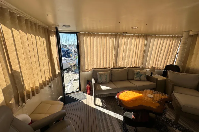 Slide: The Image of Luxurious interior of 2006 Novatec Islander 55 yacht with cozy seating and elegant decor. - 29