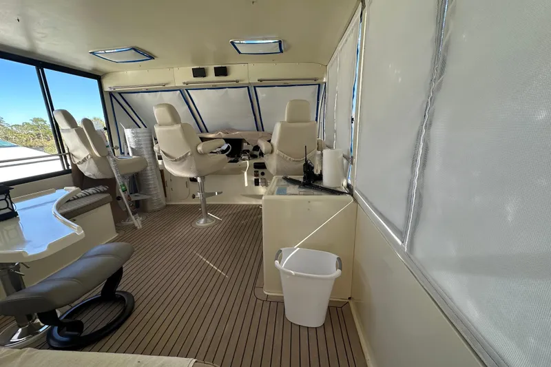 Slide: The Image of Interior of 2006 Novatec Islander 55 yacht with seating and navigation area. - 33