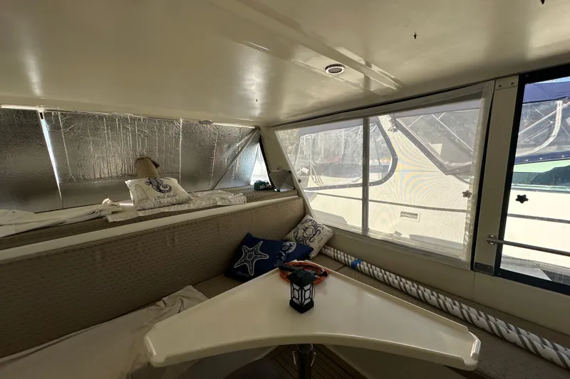 Slide: The Image of Interior of 2006 Novatec Islander 55 yacht with cozy seating and nautical decor. - 37