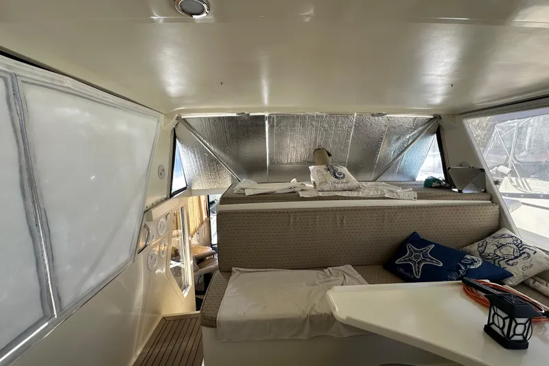 Slide: The Image of Interior of 2006 Novatec Islander 55 yacht with cozy seating and nautical decor. - 38