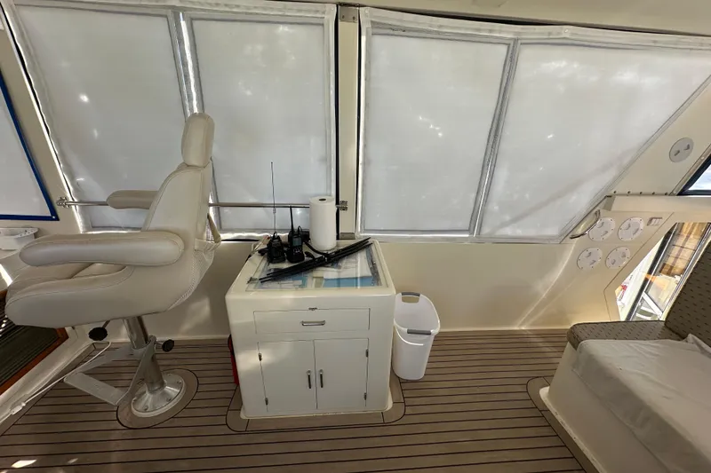 Slide: The Image of Interior of 2006 Novatec Islander 55 yacht with captain's chair and navigation equipment. - 39