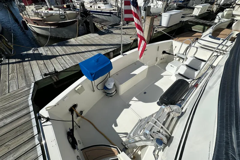 Slide: The Image of Novatec Islander 55 yacht, 2006 model, docked with American flag and deck equipment. - 4