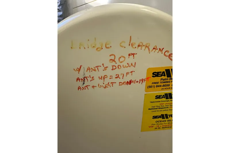 Slide: The Image of Novatec Islander 55, 2006, bridge clearance details with Sea Tow stickers. - 40