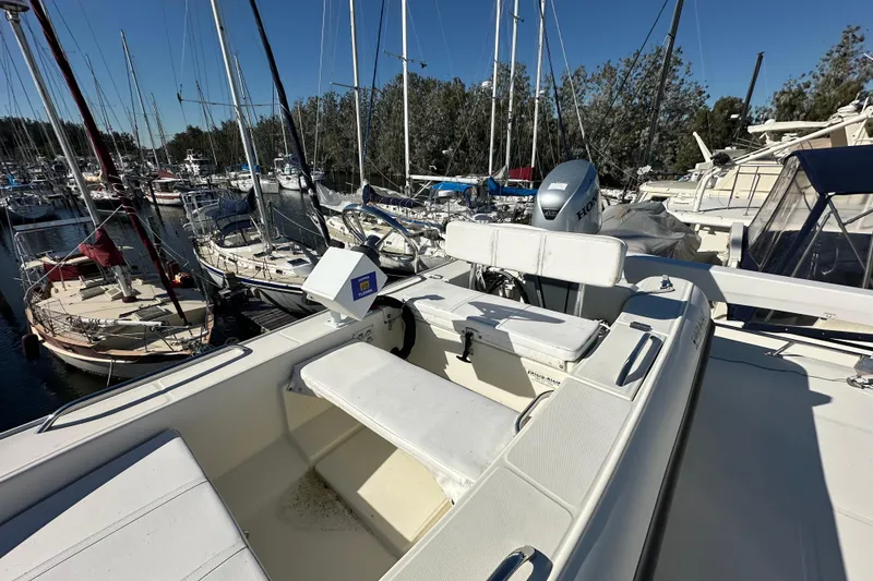 Slide: The Image of Novatec Islander 55 yacht, 2006 model, docked in a marina with other boats. - 50