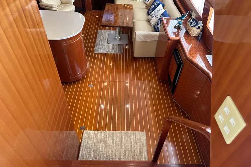 Slide: The Image of Luxurious interior of 2006 Novatec Islander 55 yacht with polished wood flooring. - 54