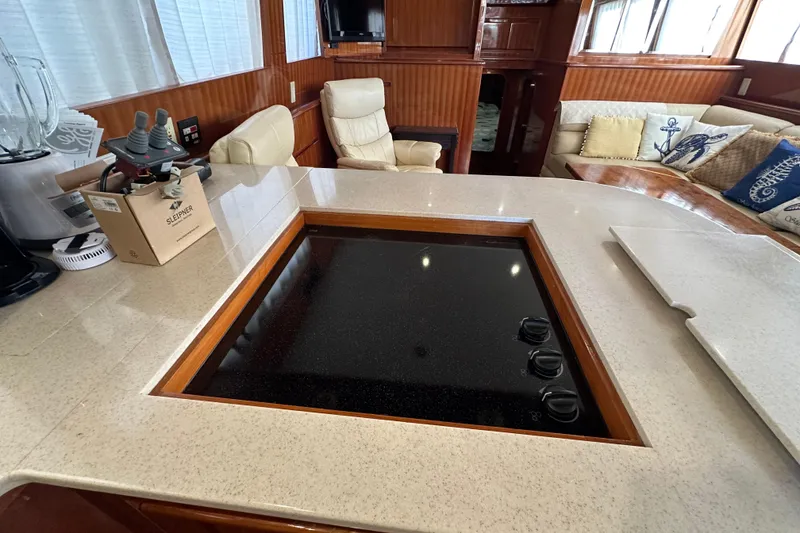 Slide: The Image of Luxurious 2006 Novatec Islander 55 yacht interior with modern kitchen and comfortable seating. - 64