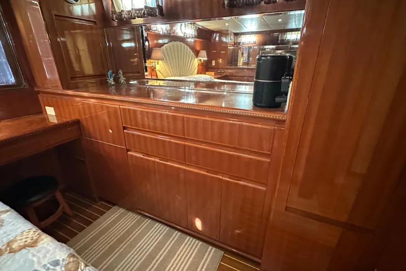 Slide: The Image of Luxurious wooden interior of 2006 Novatec Islander 55 yacht with mirror and cabinetry. - 73
