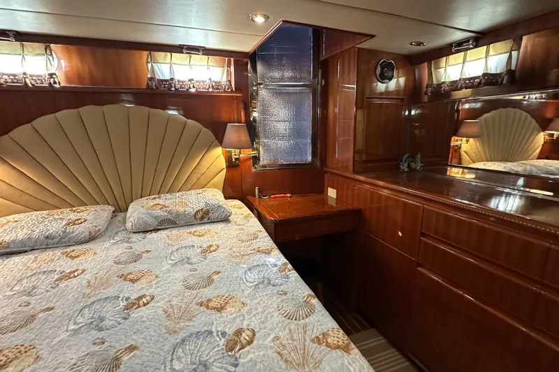 Slide: The Image of Luxurious bedroom interior of 2006 Novatec Islander 55 yacht with elegant wood finish. - 74