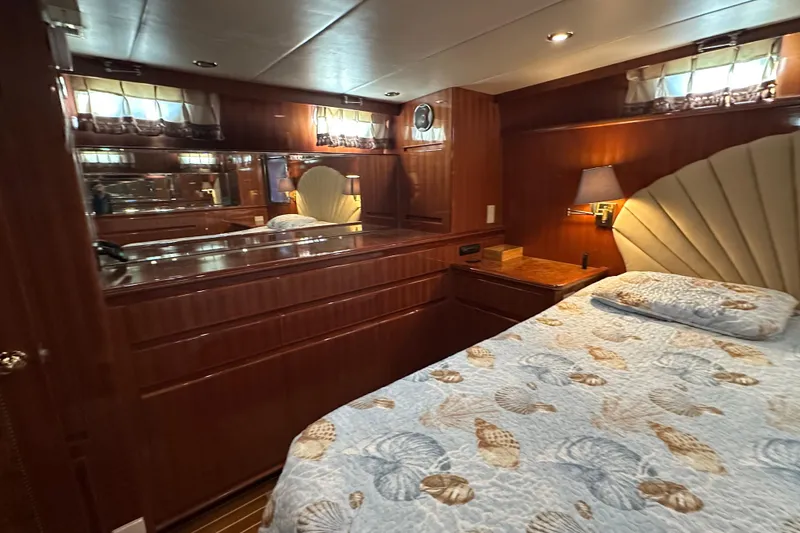 Slide: The Image of Luxurious cabin interior of 2006 Novatec Islander 55 yacht with elegant wood finish. - 76