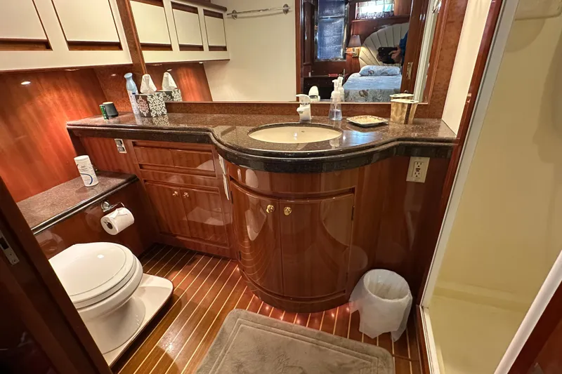 Slide: The Image of Luxurious bathroom in 2006 Novatec Islander 55 yacht with elegant wood finishes. - 79